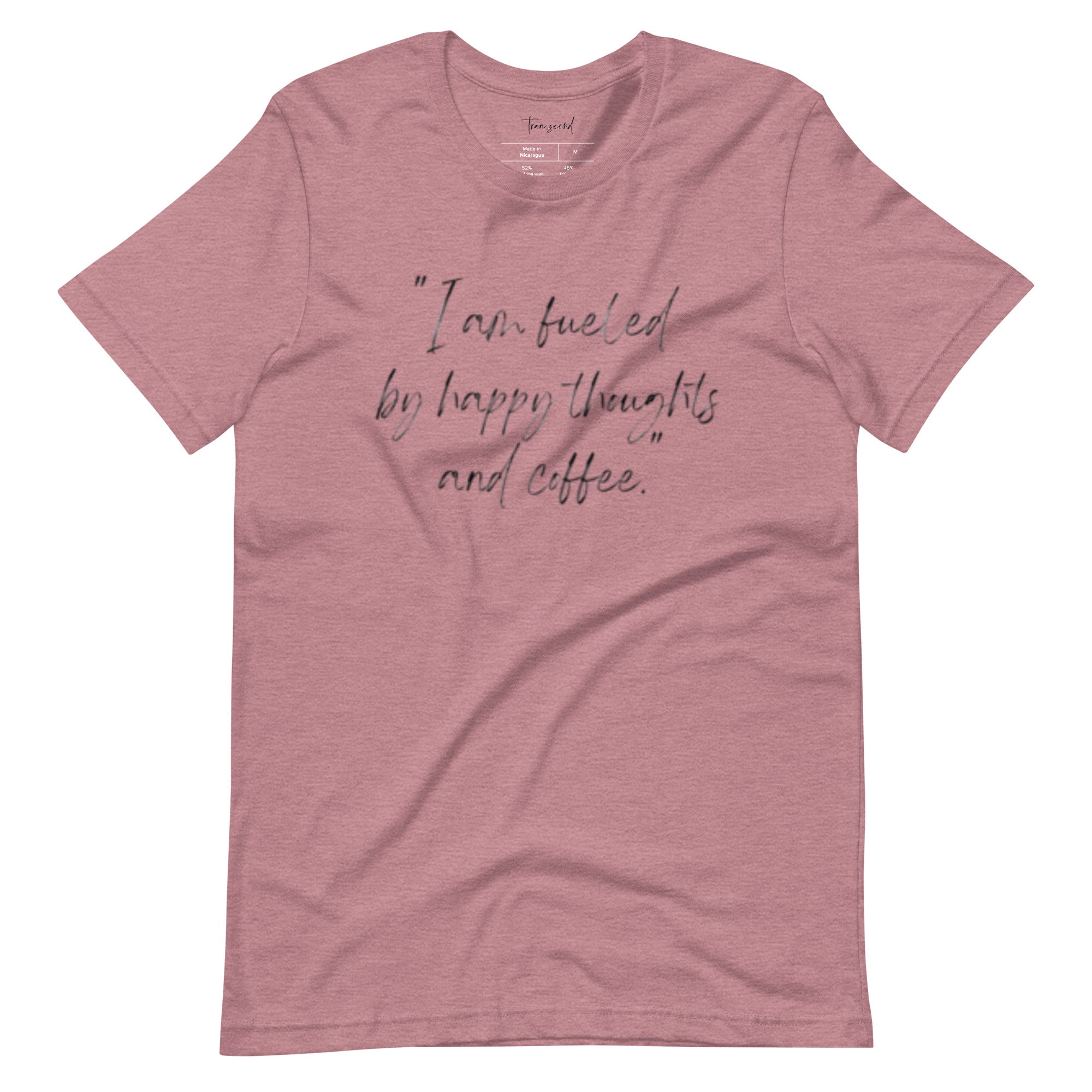 I Am Fueled by Happy Thoughts and Coffee Unisex Tee displayed in various colors, showcasing its soft cotton fabric and stylish design.