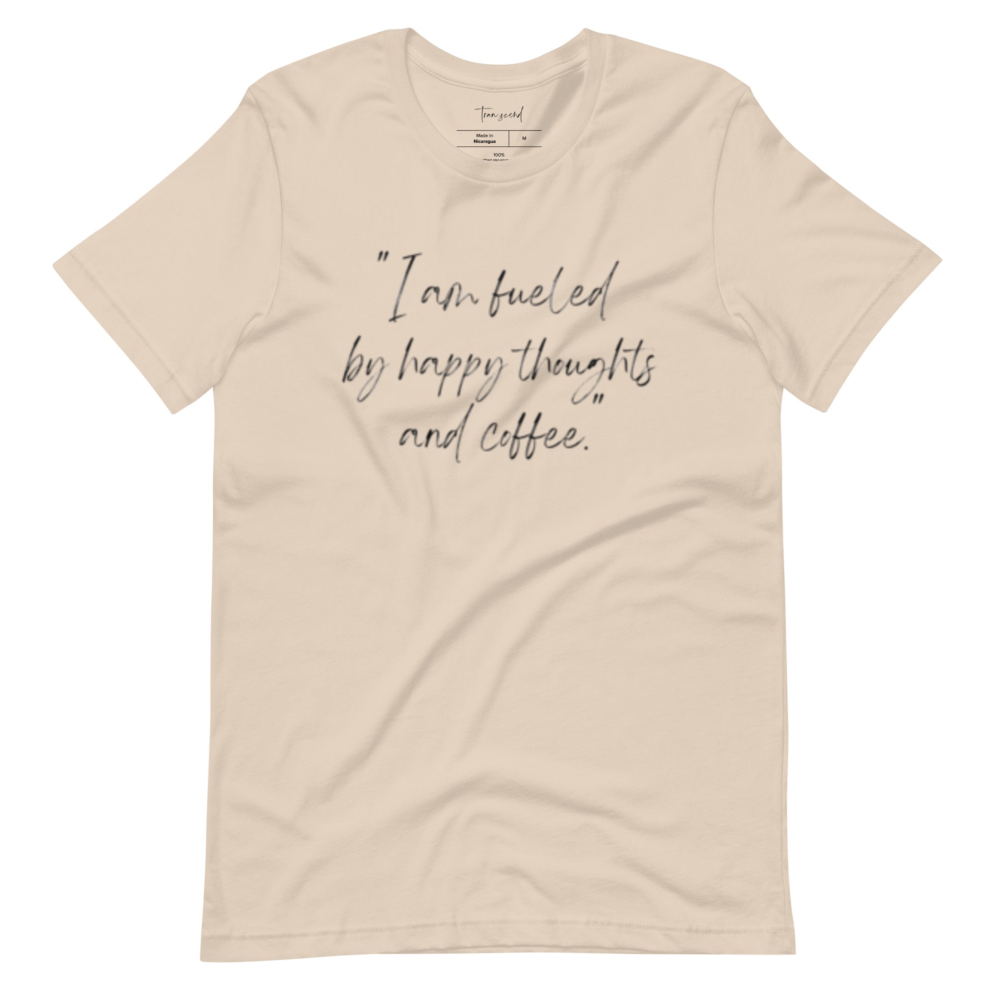 I Am Fueled by Happy Thoughts and Coffee Unisex Tee displayed in various colors, showcasing its soft cotton fabric and stylish design.