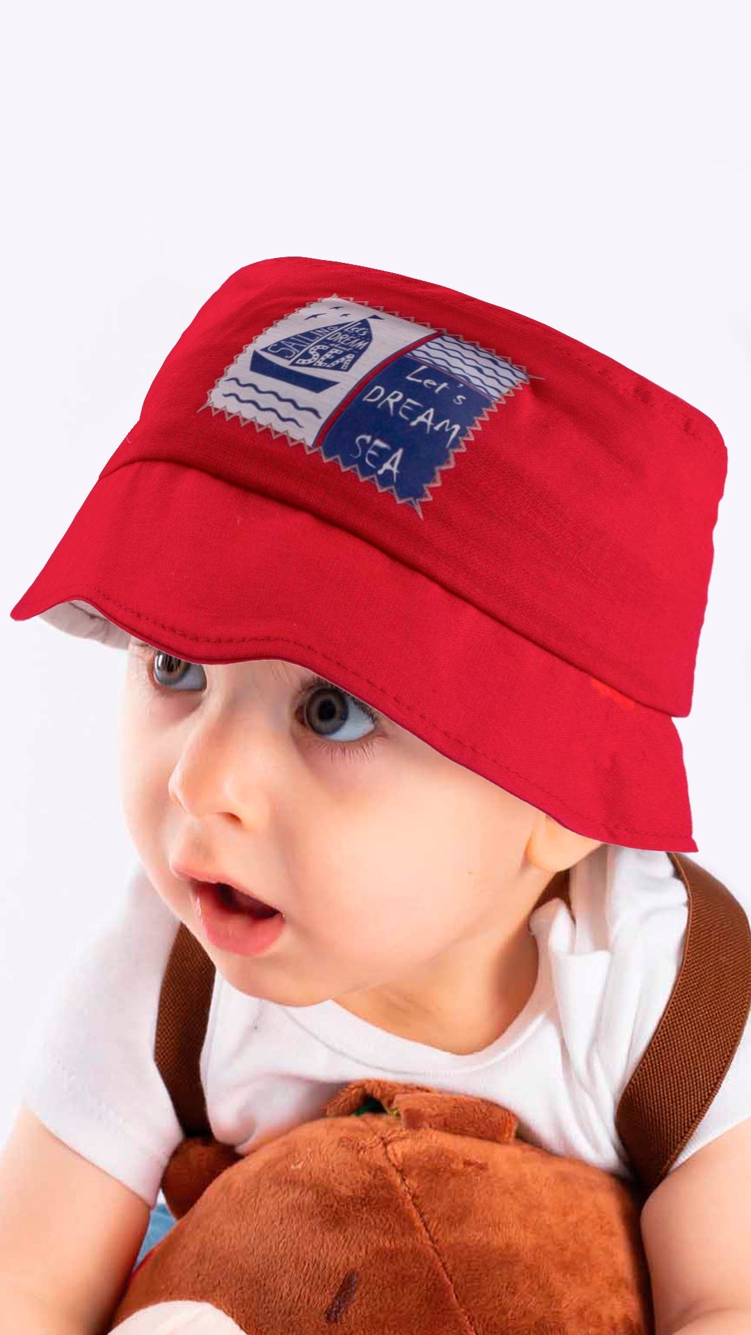 Infant to Toddler Bucket Hat featuring a Let's Dream Sea-Nautical Sailing Theme, designed for comfort and sun protection.