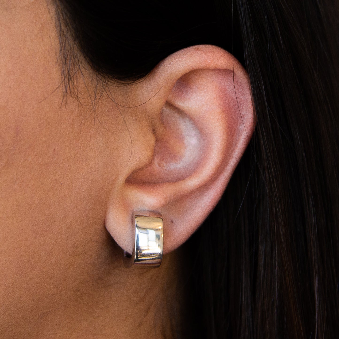 Elegant Italian Sterling Silver Square Hoop Earrings showcasing a modern design with a polished finish.