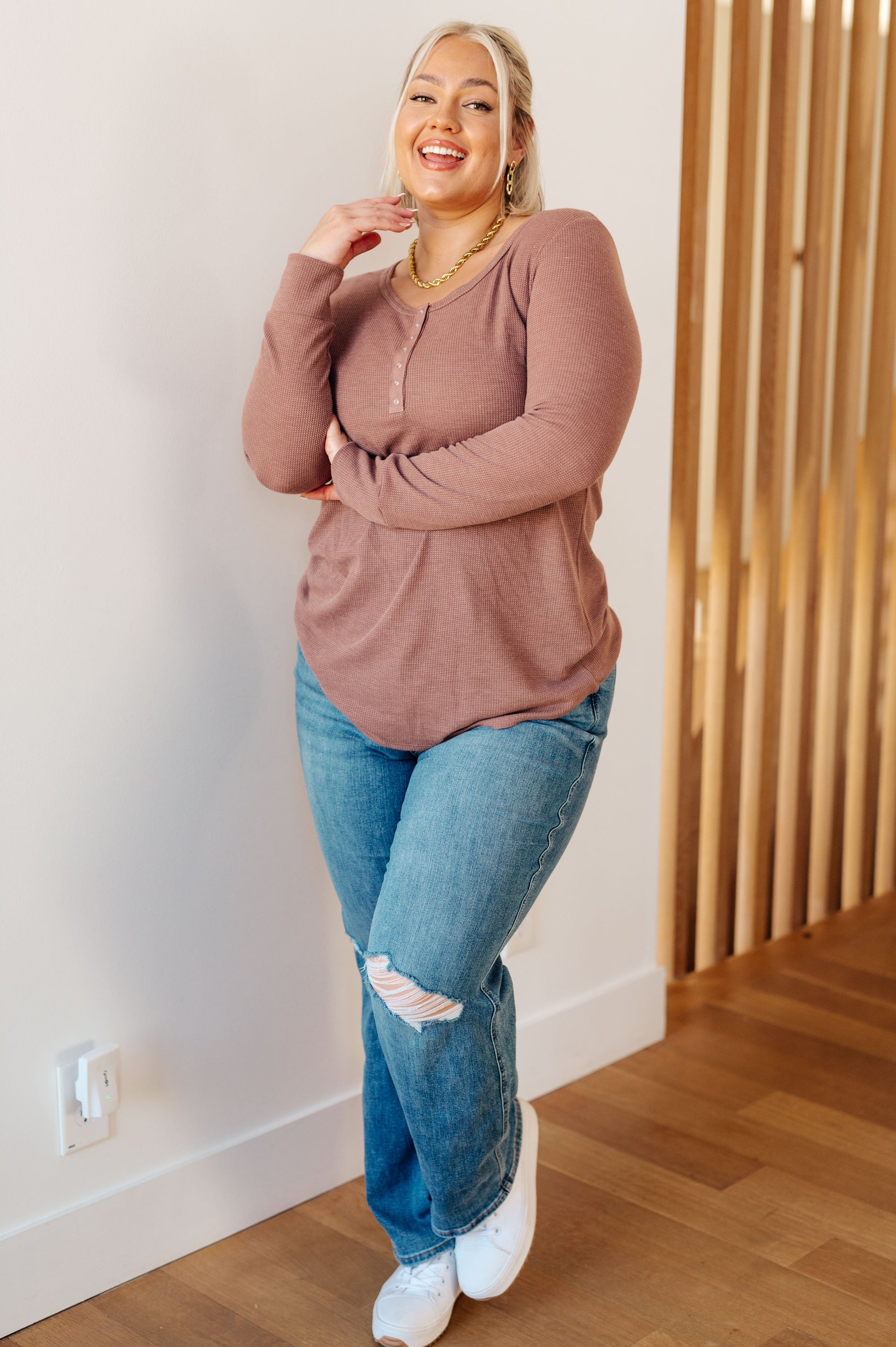 A cozy It's Been So Long Henley in Mulberry, featuring a scoop neckline and snap henley design, perfect for winter wear.