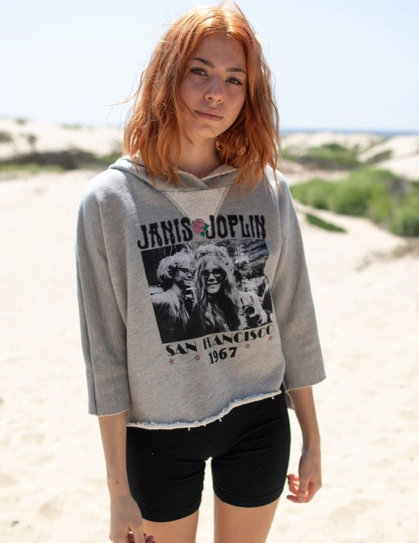 Cropped Janis Joplin hoodie in heathered gray with graphic print, featuring raw baseball hem and 3/4 sleeves.
