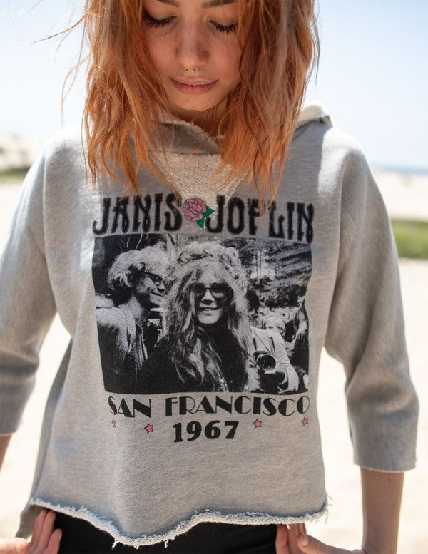 Cropped Janis Joplin hoodie in heathered gray with graphic print, featuring raw baseball hem and 3/4 sleeves.