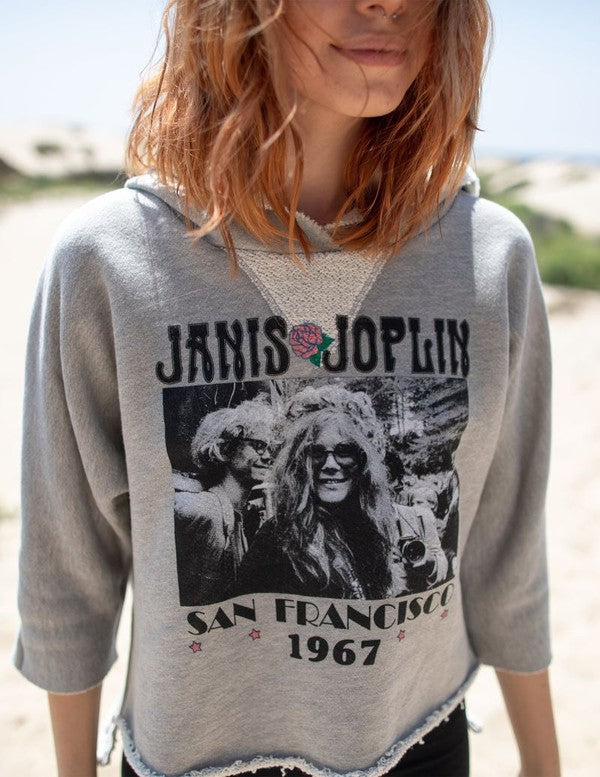 Cropped Janis Joplin hoodie in heathered gray with graphic print, featuring raw baseball hem and 3/4 sleeves.