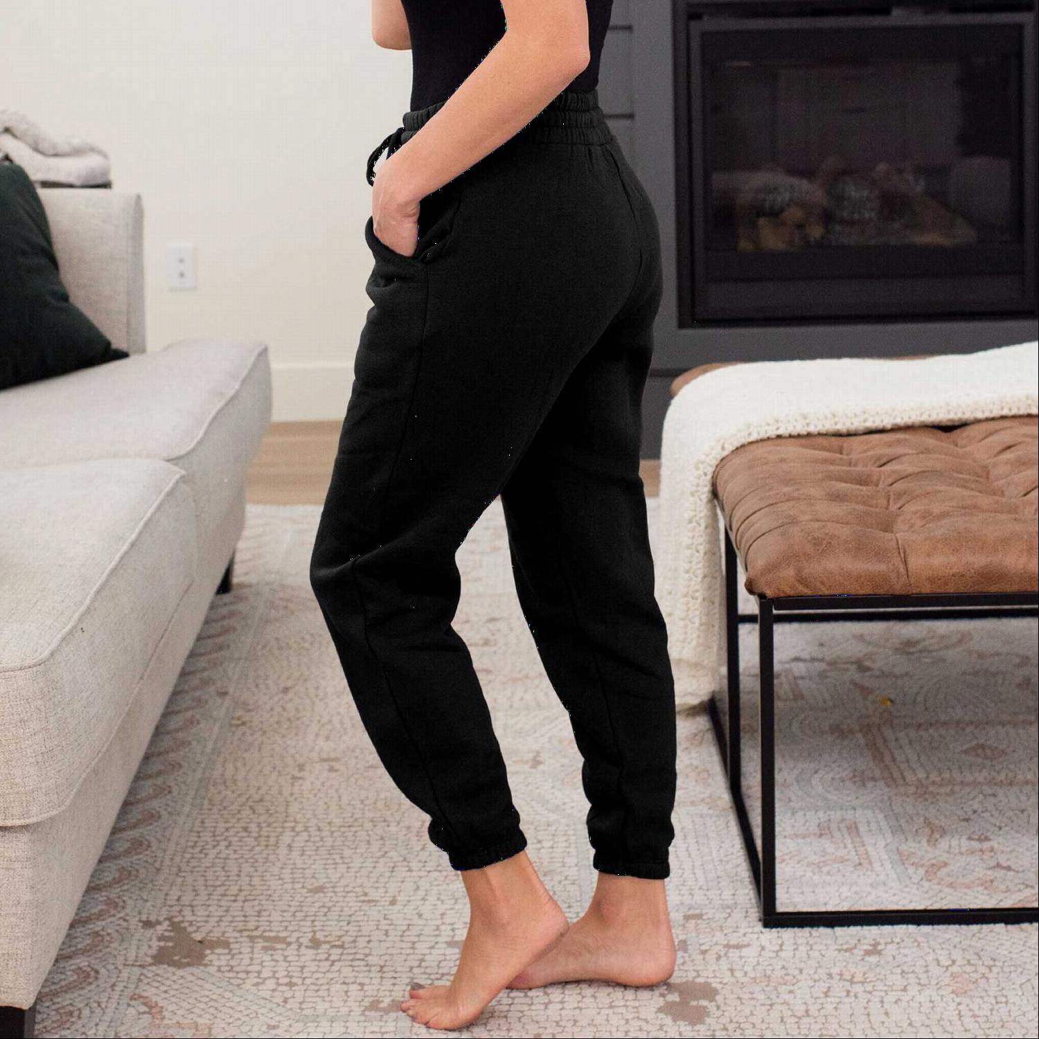 Comfortable jogger sweatpants with elastic waistband and fitted ankles, featuring side pockets for convenience.