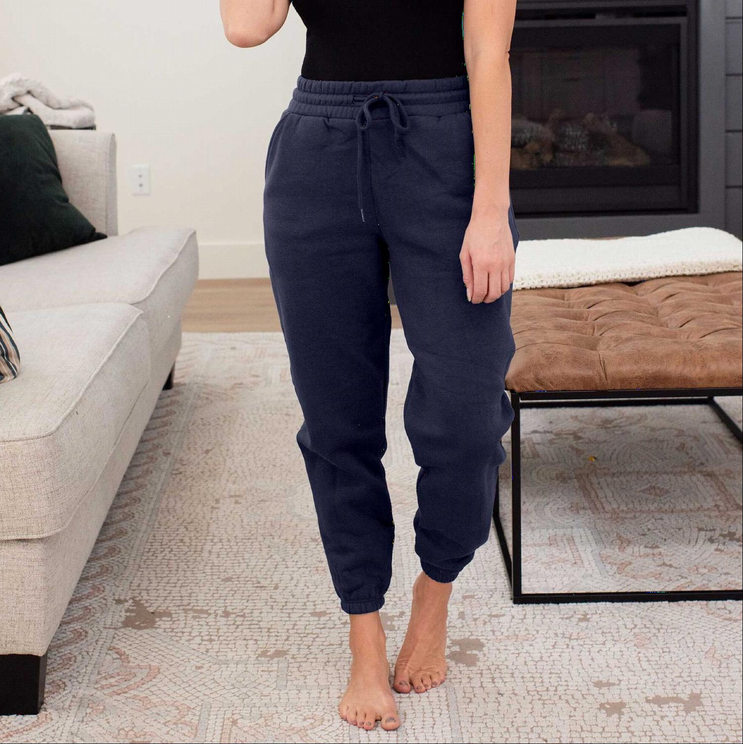 Comfortable jogger sweatpants with elastic waistband and fitted ankles, featuring side pockets for convenience.