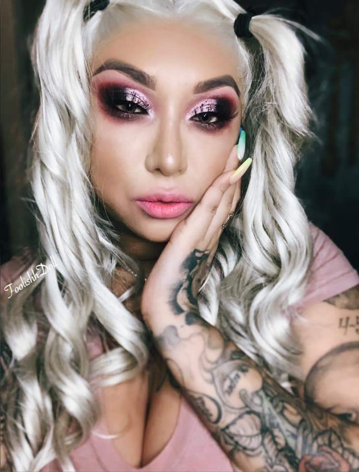 Juliette wig featuring platinum blonde color, 26 inches long, with a lace front and adjustable cap for comfort.