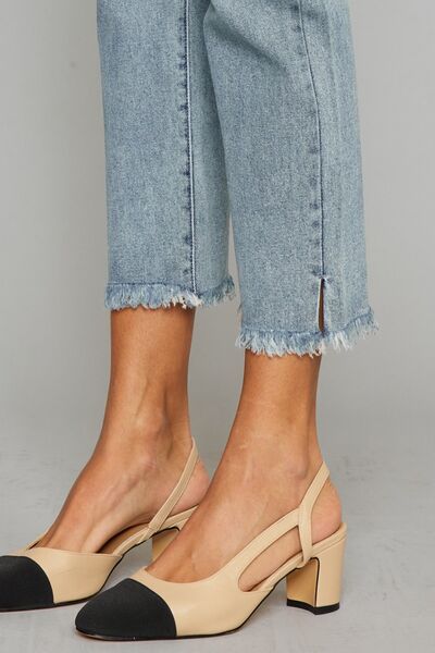 Kancan High Waist Button Fly Raw Hem Cropped Straight Jeans showcasing a stylish high waist, button fly, and raw hem detailing.