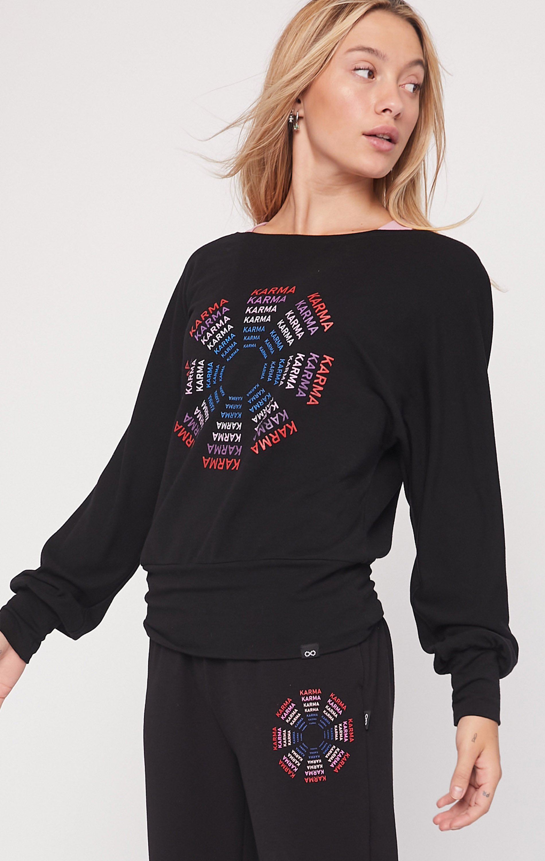 Karma Graphic Viscose Blend Long Sleeve Top featuring off-shoulder design and vibrant print, perfect for casual wear.