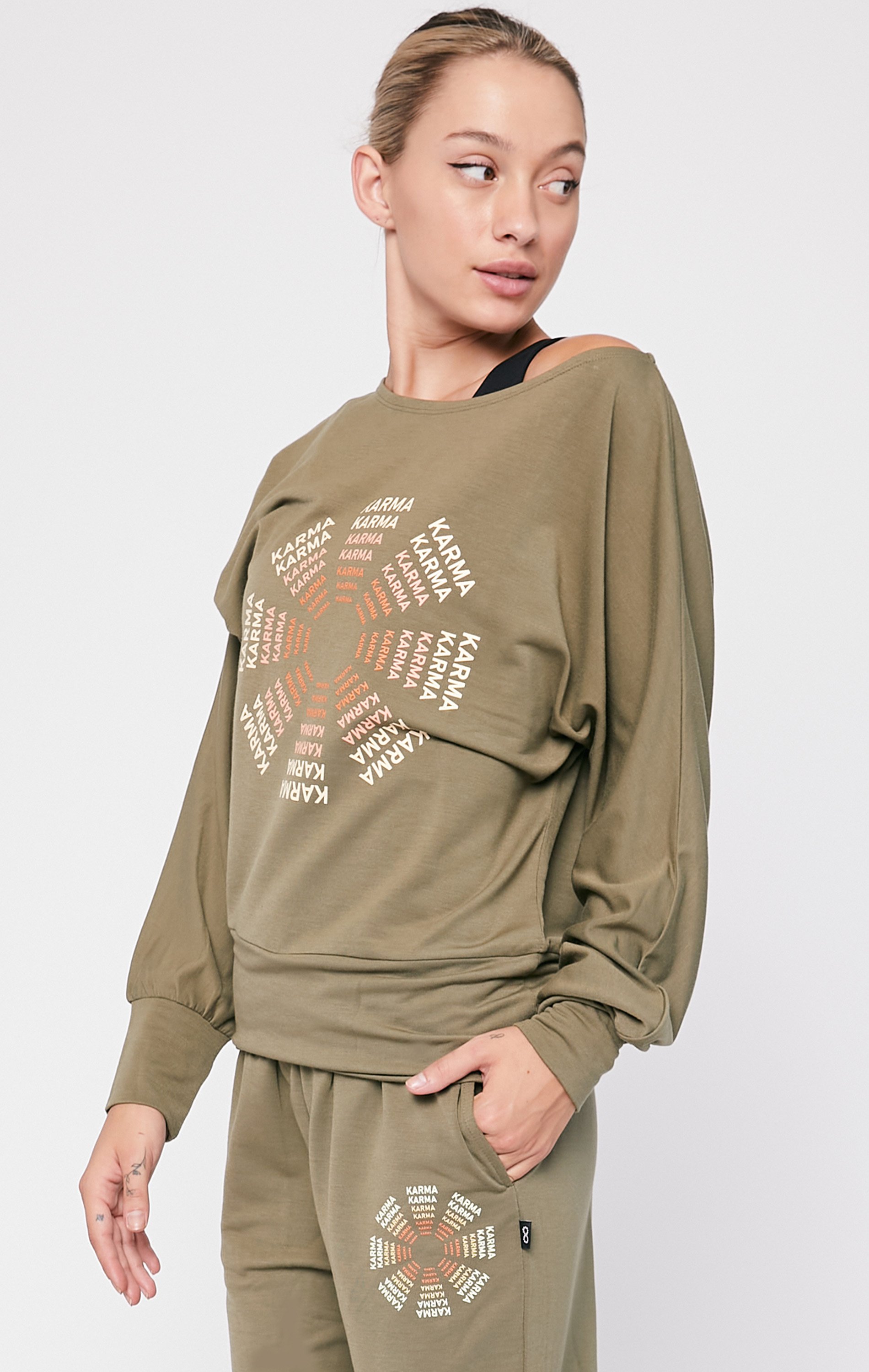 Karma Graphic Viscose Blend Long Sleeve Top featuring off-shoulder design and vibrant print, perfect for casual wear.