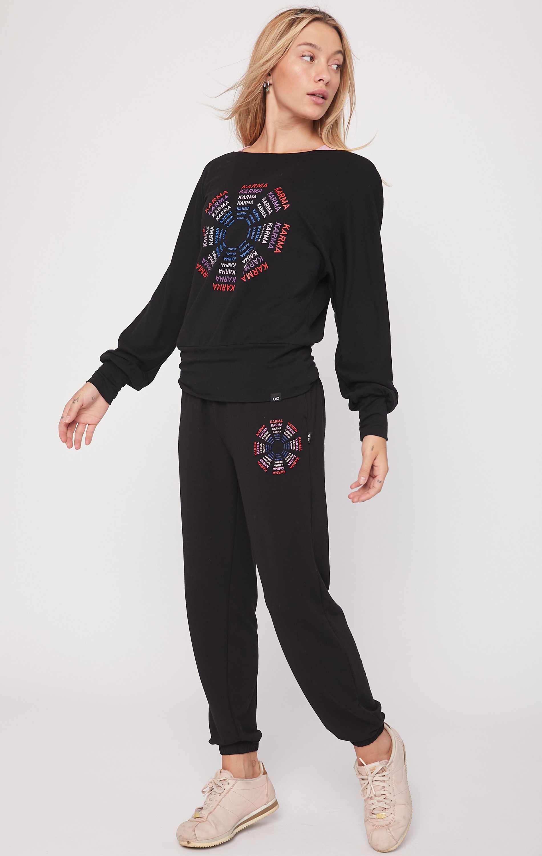 Karma Graphic Viscose Blend Sweatpants featuring vibrant print and soft fabric, perfect for lounging and casual outings.