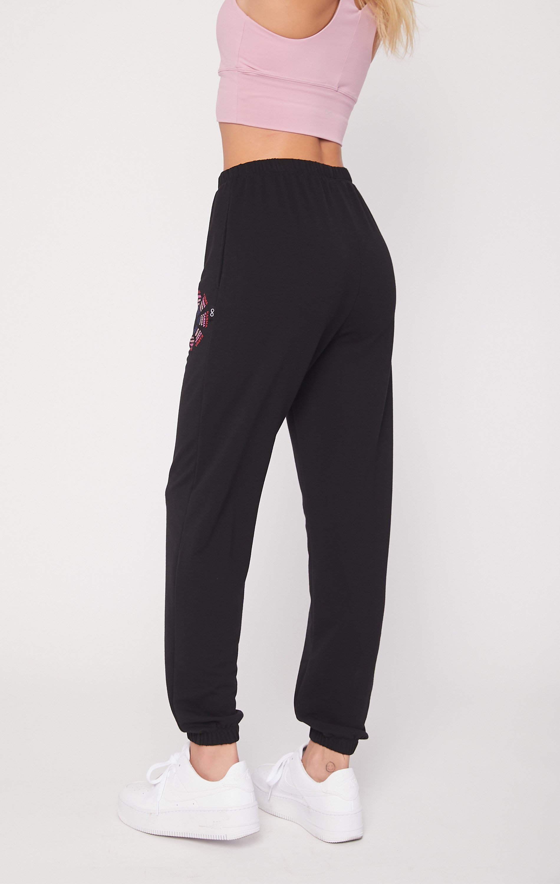 Karma Graphic Viscose Blend Sweatpants featuring vibrant print and soft fabric, perfect for lounging and casual outings.