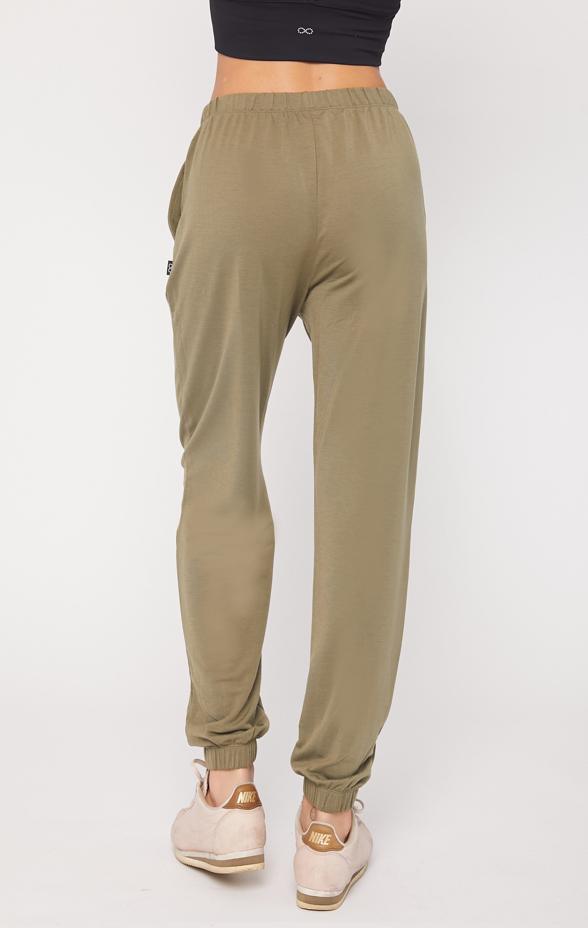 Karma Graphic Viscose Blend Sweatpants featuring vibrant print and soft fabric, perfect for lounging and casual outings.