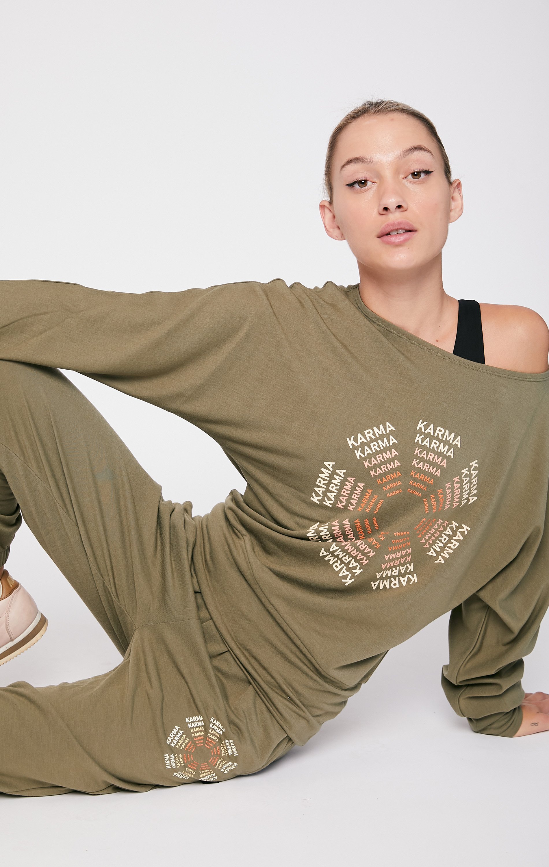 Karma Graphic Viscose Blend Sweatpants featuring vibrant print and soft fabric, perfect for lounging and casual outings.