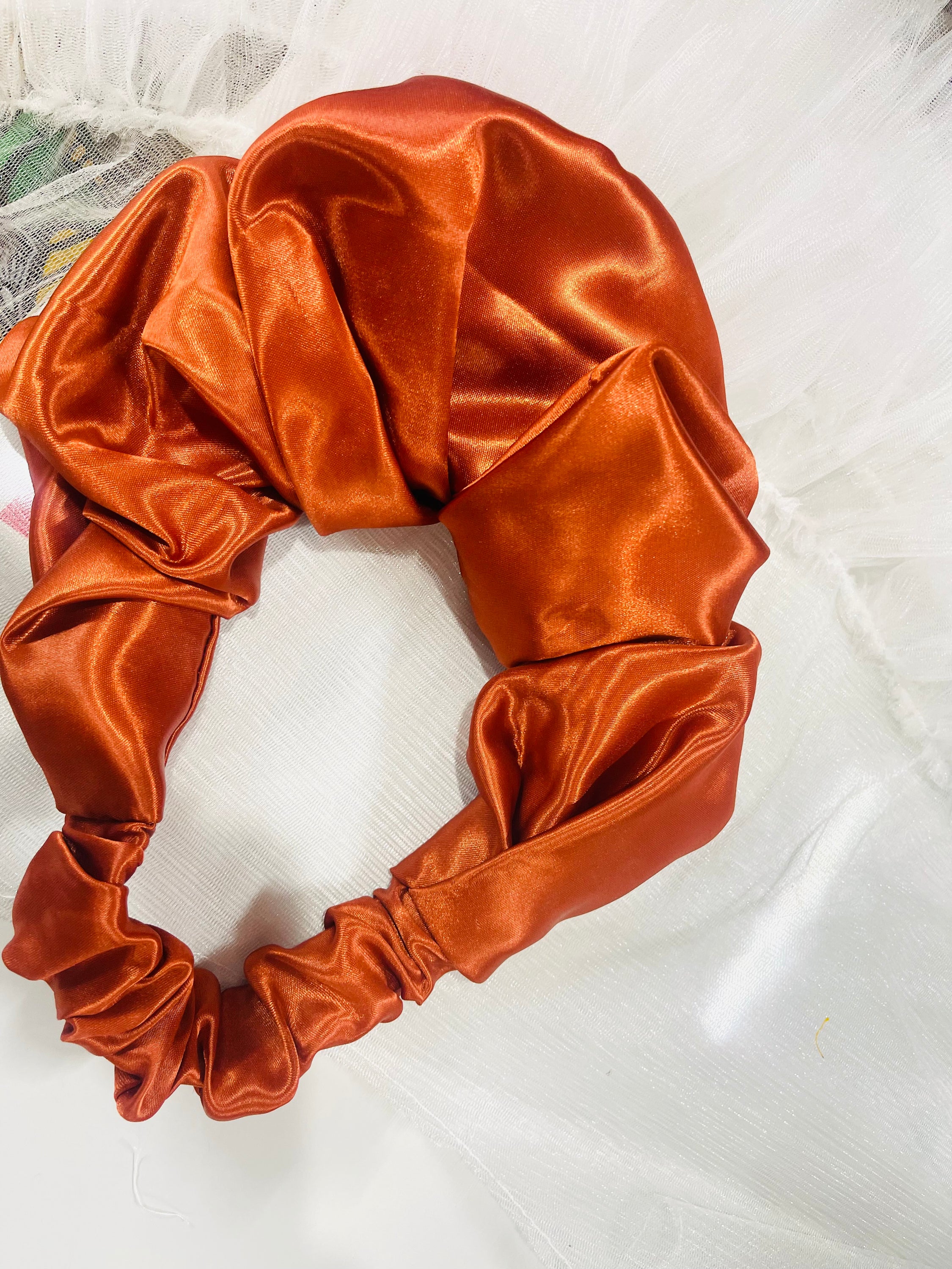 Keggie Scrunchie in soft satin with adjustable ruffles, available in various colors.