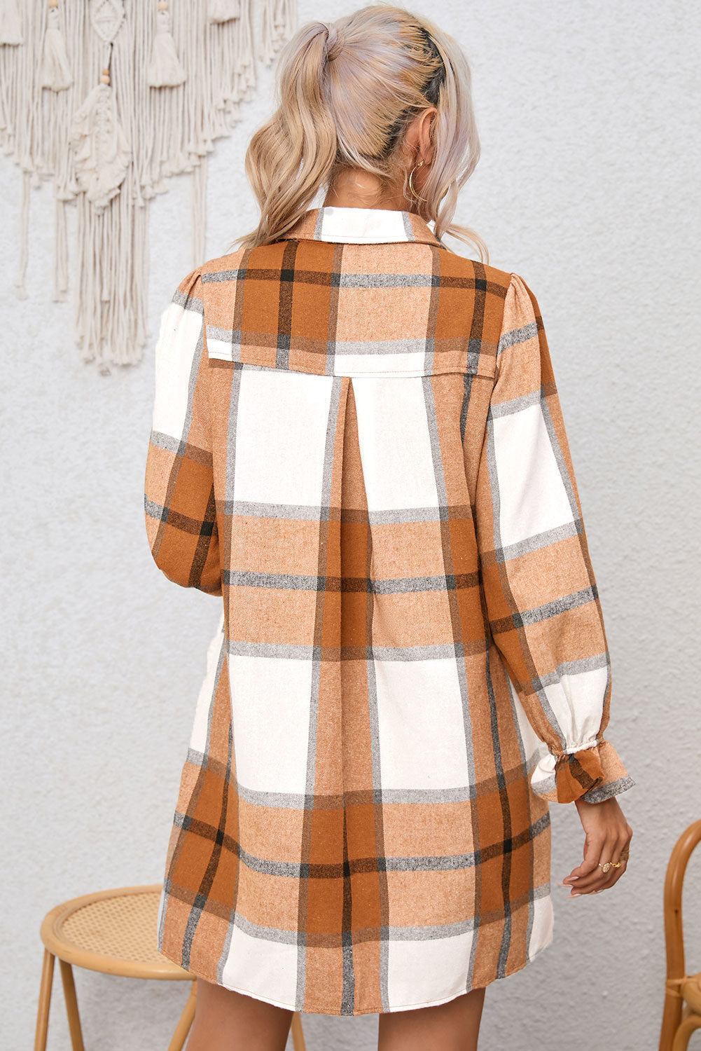 A stylish khaki plaid shirt dress featuring a collared neck and ruffled sleeves, perfect for autumn fashion.