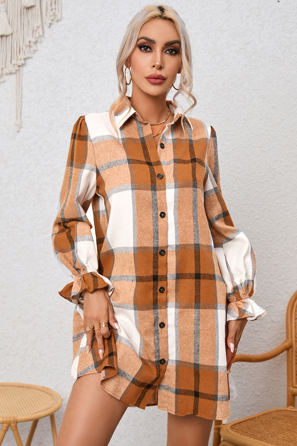 A stylish khaki plaid shirt dress featuring a collared neck and ruffled sleeves, perfect for autumn fashion.