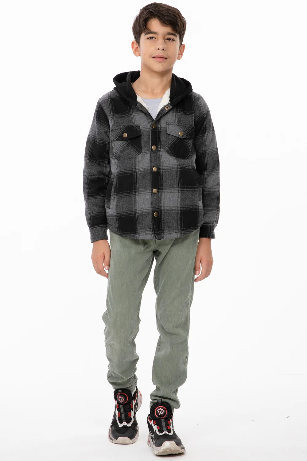 Kids fleece-lined snap flannel shirt with hood in plaid design, featuring pockets and soft sherpa lining.