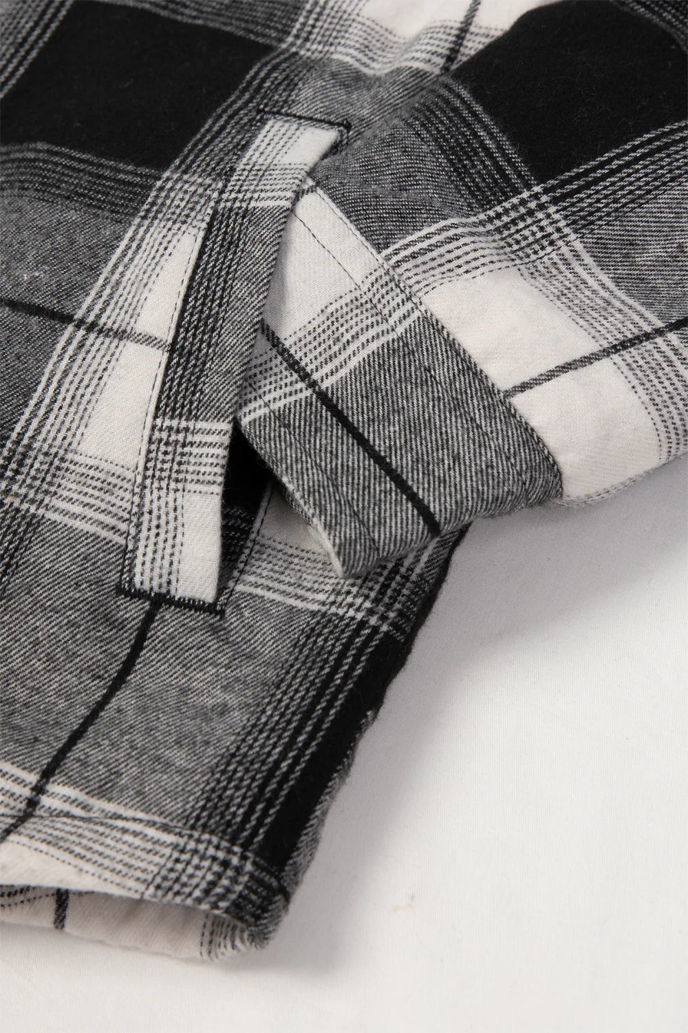 Kids Sherpa-Lined Zip Up Flannel Shirt in plaid design with hood, featuring utility pockets.