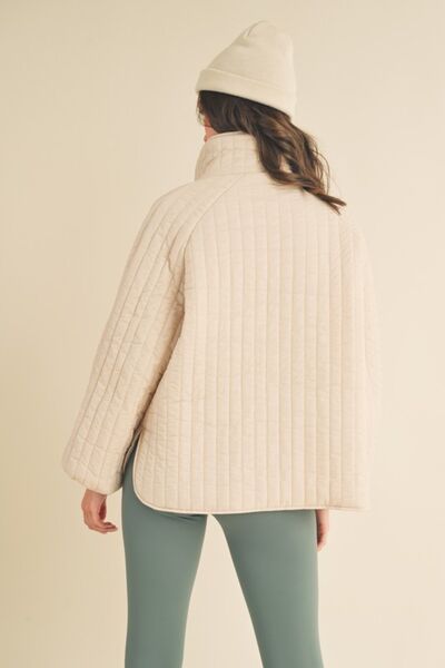 Kimberly C Classic Silhouette Quilted Snap Down Jacket in a stylish quilted design, featuring a high neckline and body-skimming fit.