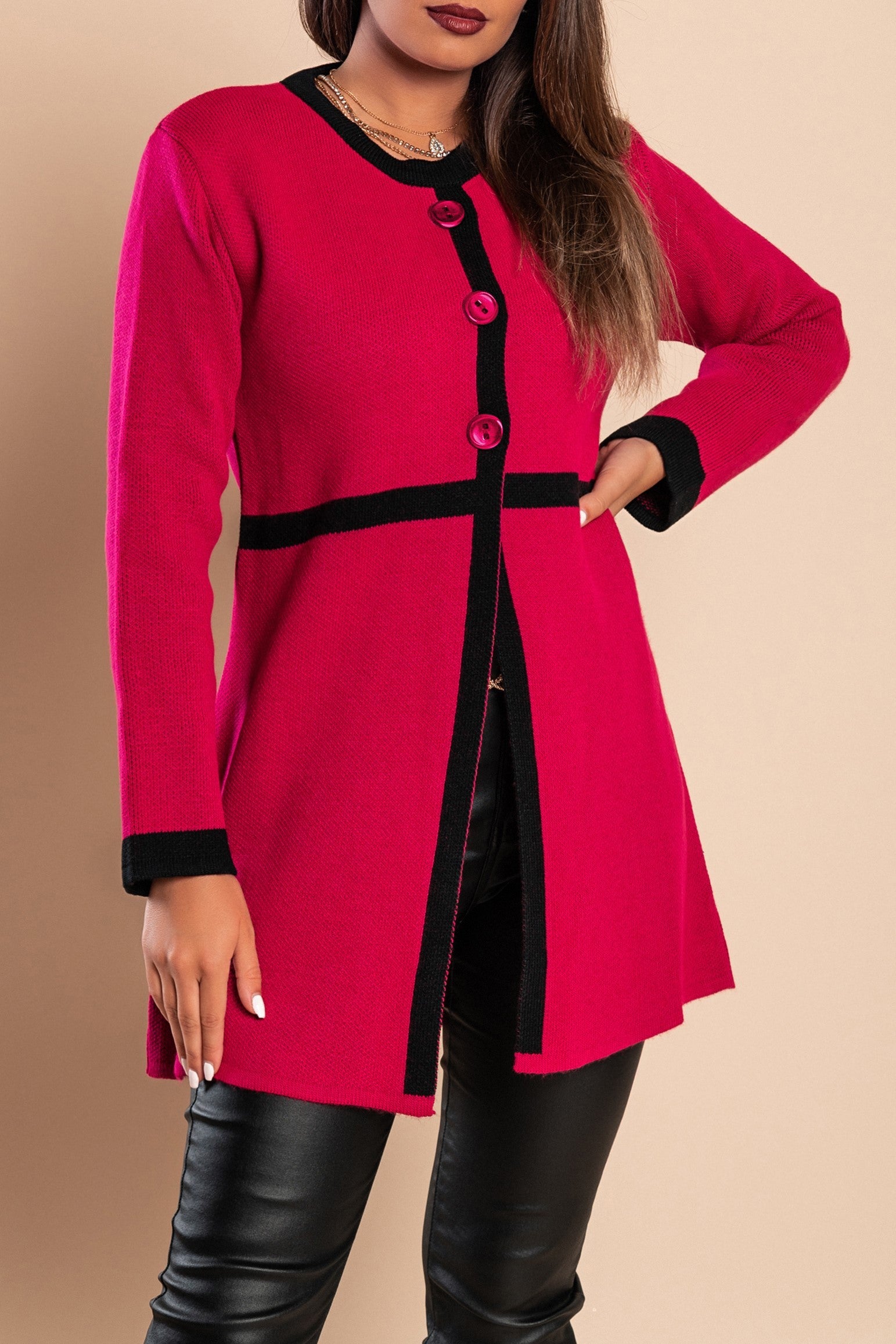 Elegant fuchsia knitted cardigan with buttons, featuring long sleeves and a round neck, made from a wool and acrylic blend.