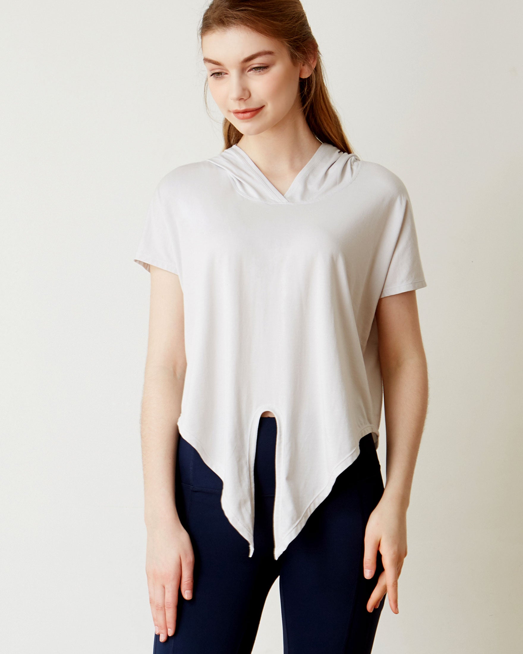 A stylish Knot Your Race Hoodie in a soft pima cotton/modal blend, showcasing its versatile design and comfortable fit.