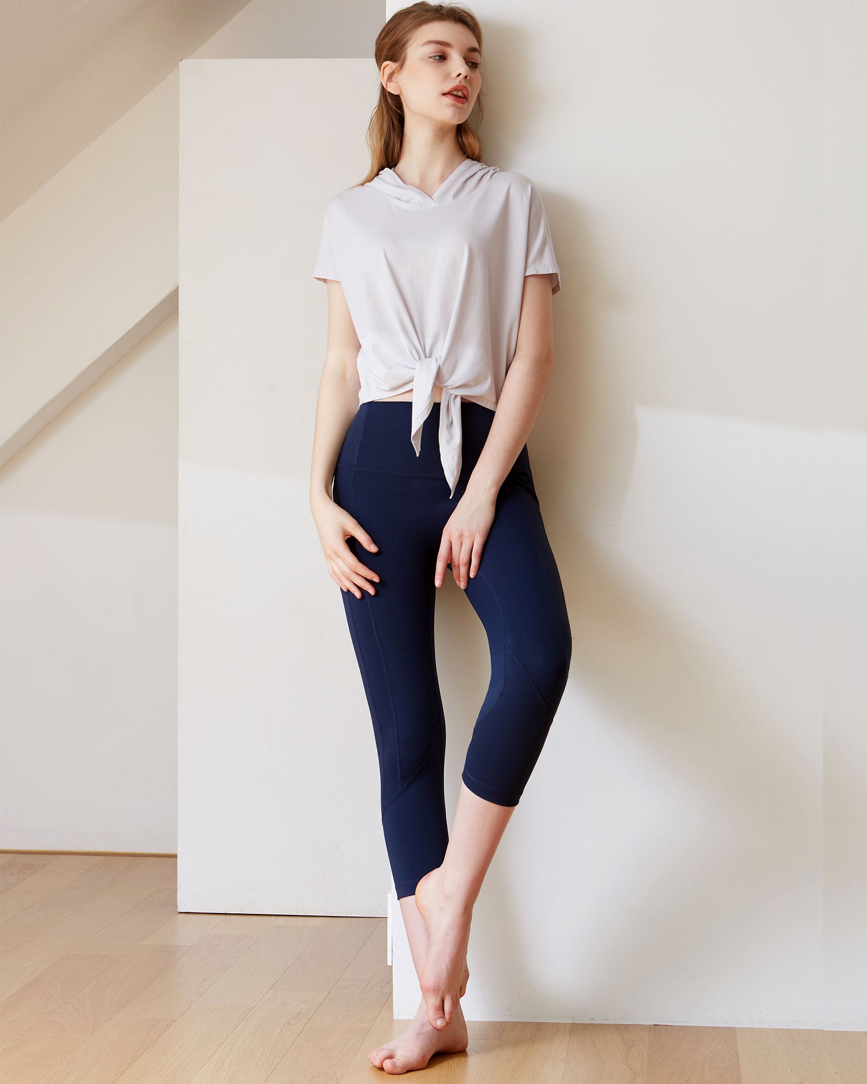 A stylish Knot Your Race Hoodie in a soft pima cotton/modal blend, showcasing its versatile design and comfortable fit.