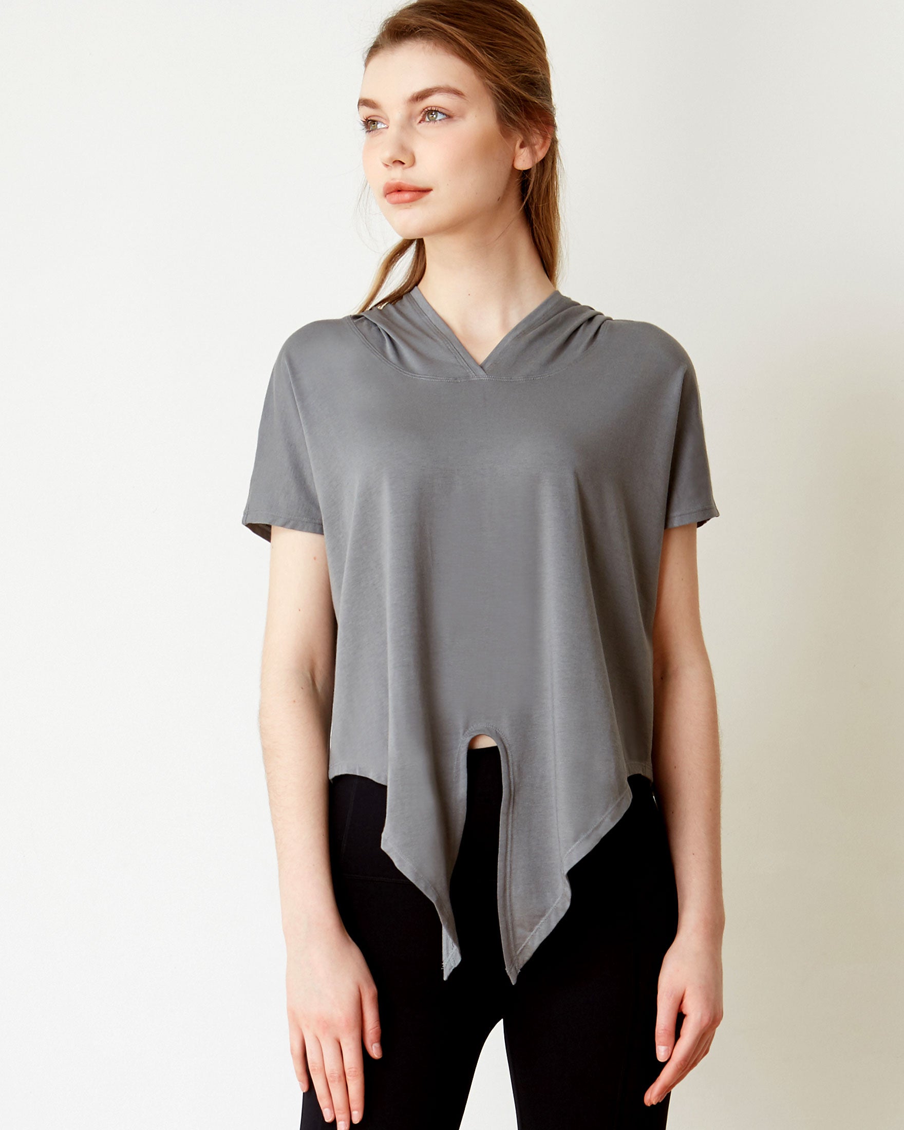 A stylish Knot Your Race Hoodie in a soft pima cotton/modal blend, showcasing its versatile design and comfortable fit.