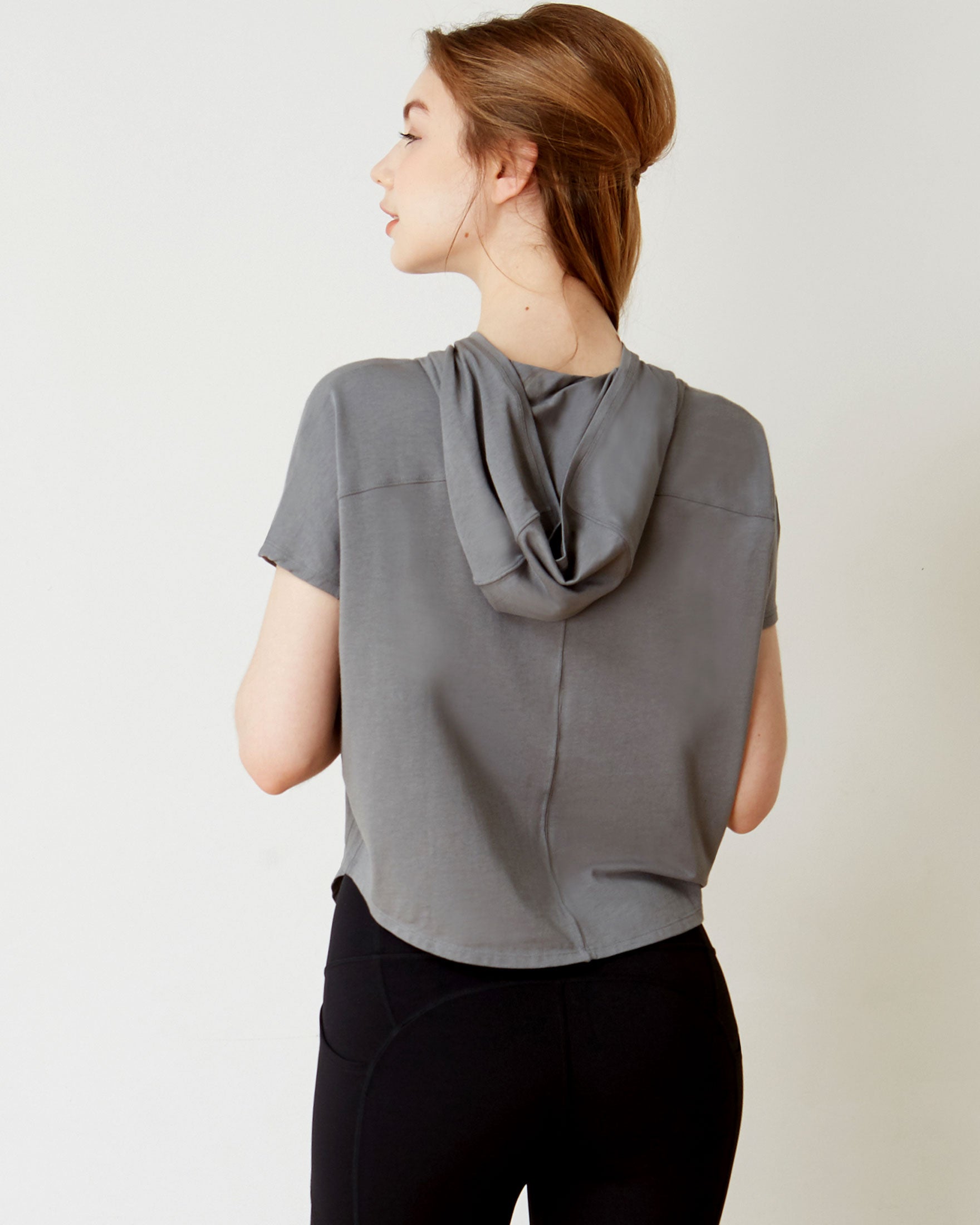 A stylish Knot Your Race Hoodie in a soft pima cotton/modal blend, showcasing its versatile design and comfortable fit.