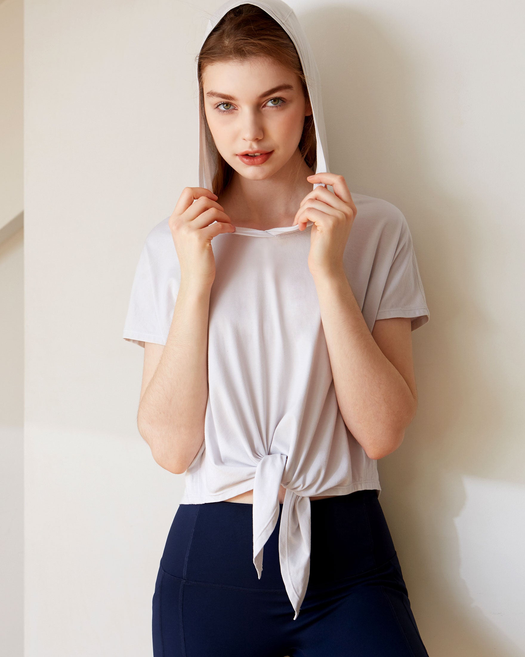 A stylish Knot Your Race Hoodie in a soft pima cotton/modal blend, showcasing its versatile design and comfortable fit.