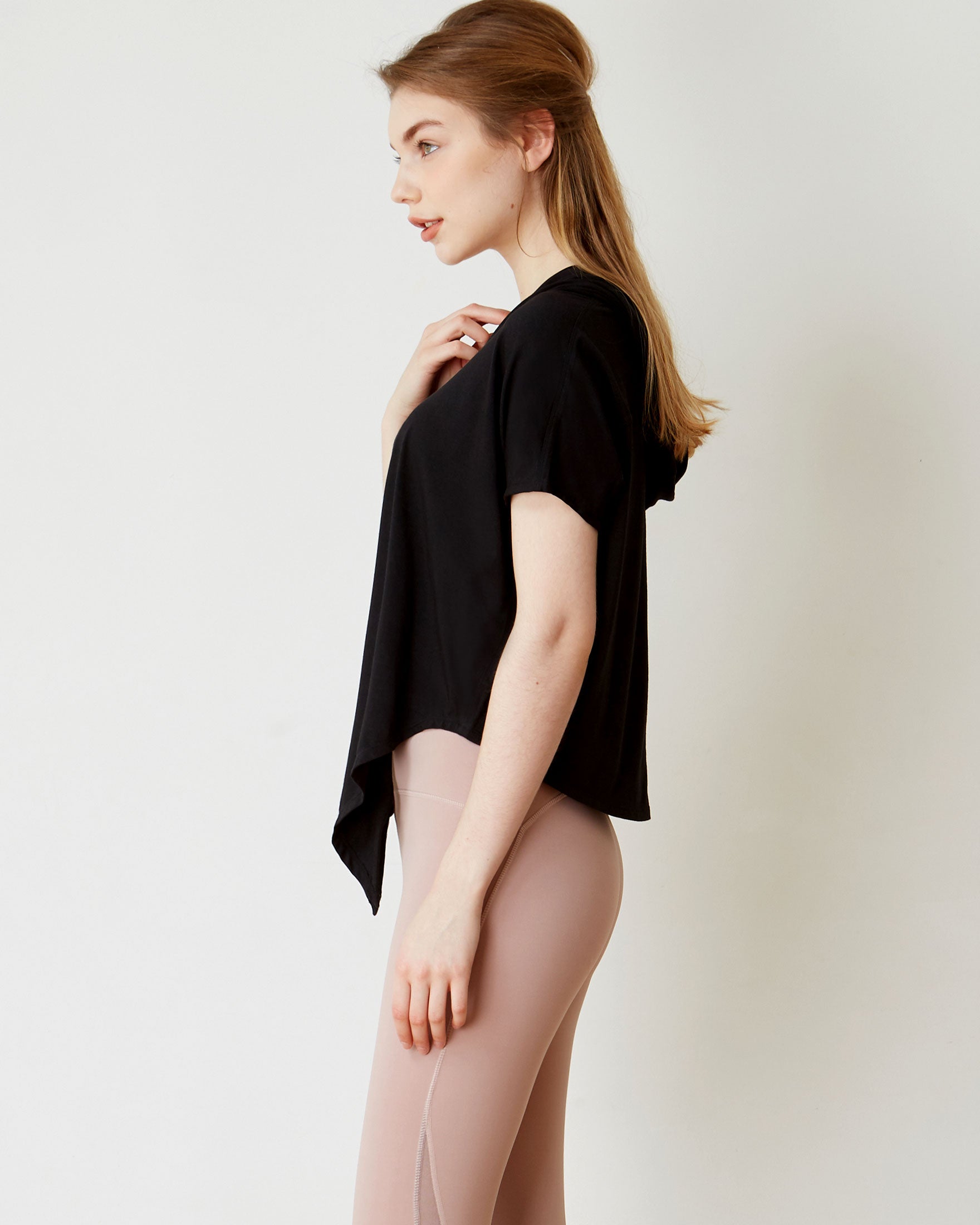 A stylish Knot Your Race Hoodie in a soft pima cotton/modal blend, showcasing its versatile design and comfortable fit.