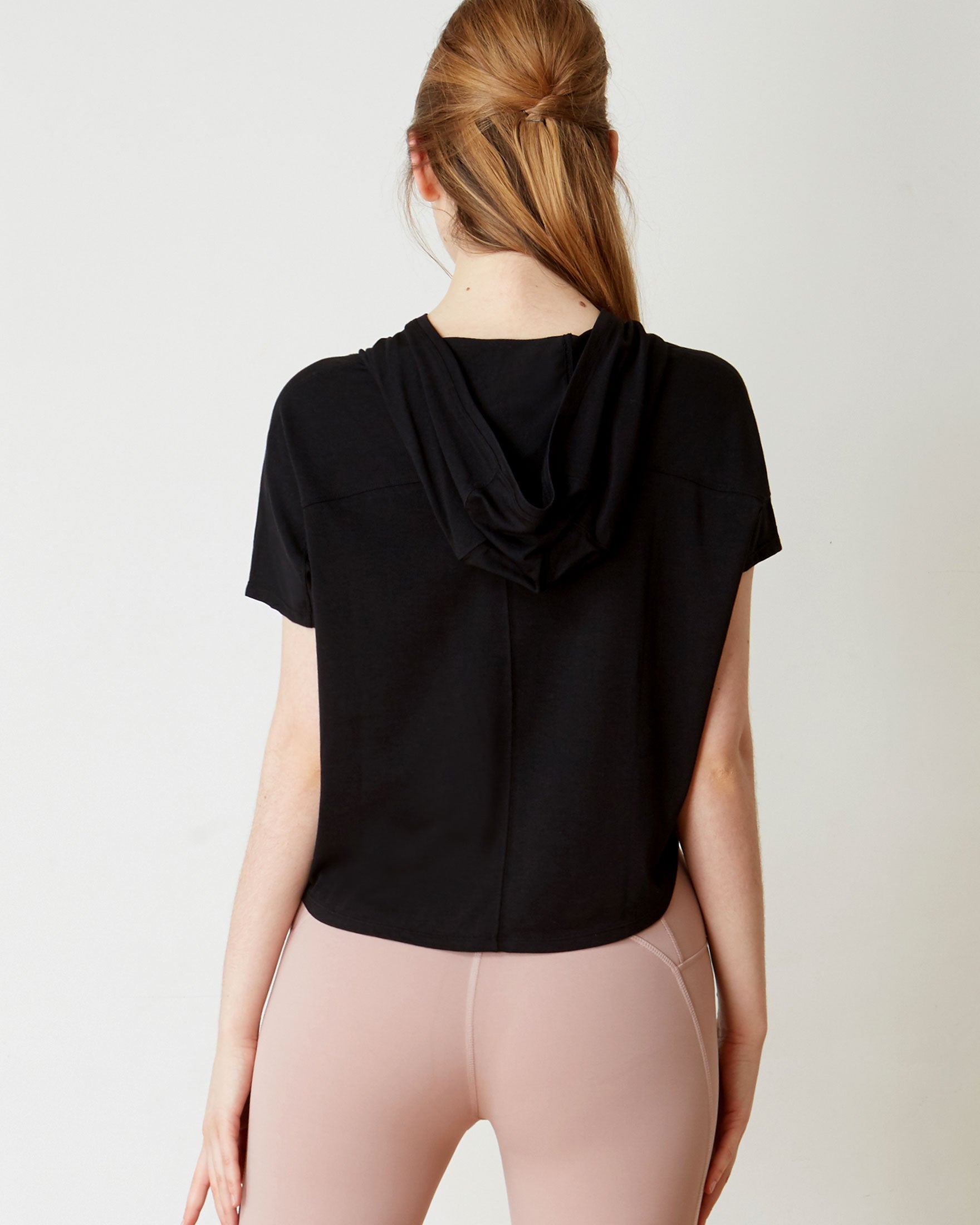 A stylish Knot Your Race Hoodie in a soft pima cotton/modal blend, showcasing its versatile design and comfortable fit.