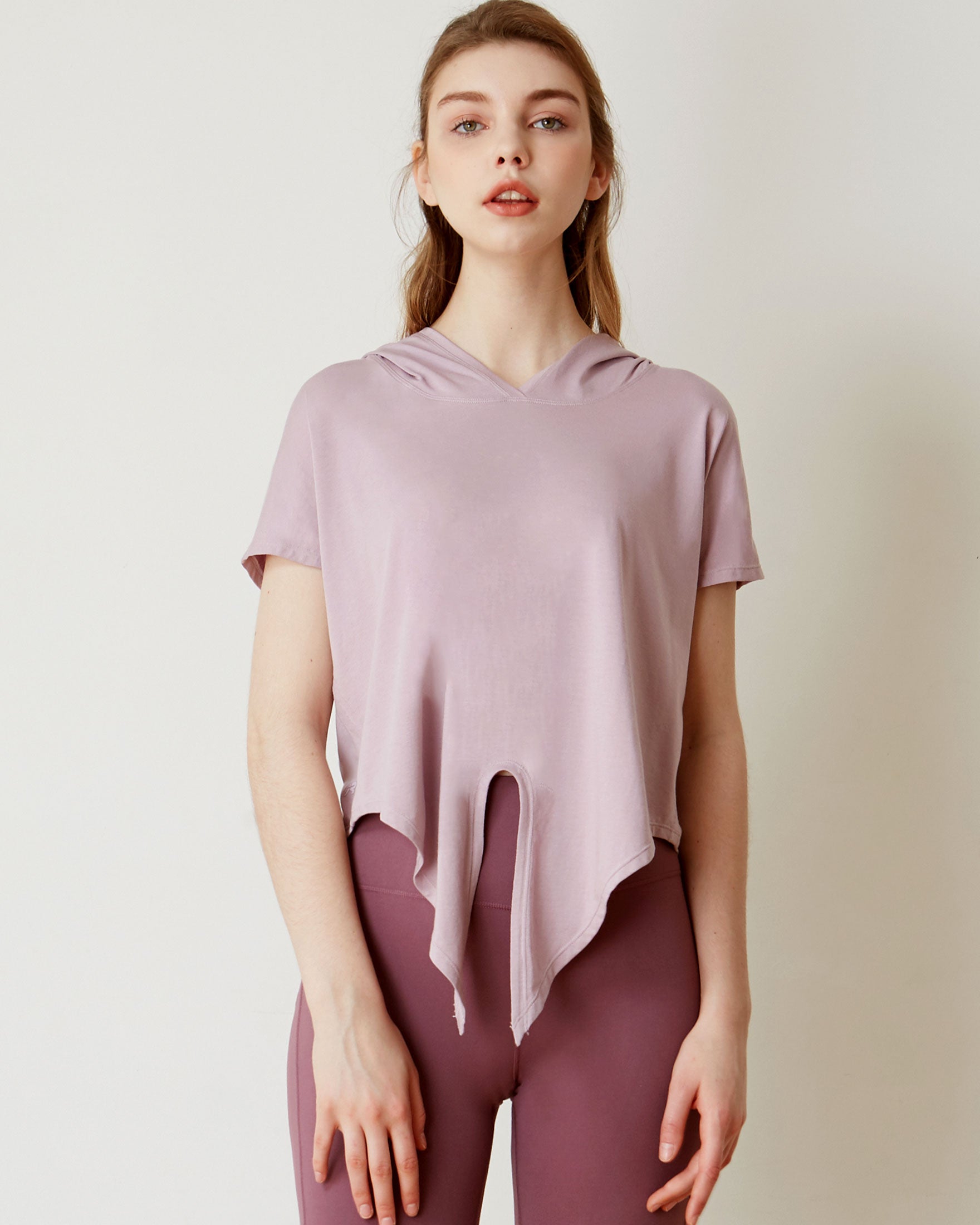 A stylish Knot Your Race Hoodie in a soft pima cotton/modal blend, showcasing its versatile design and comfortable fit.