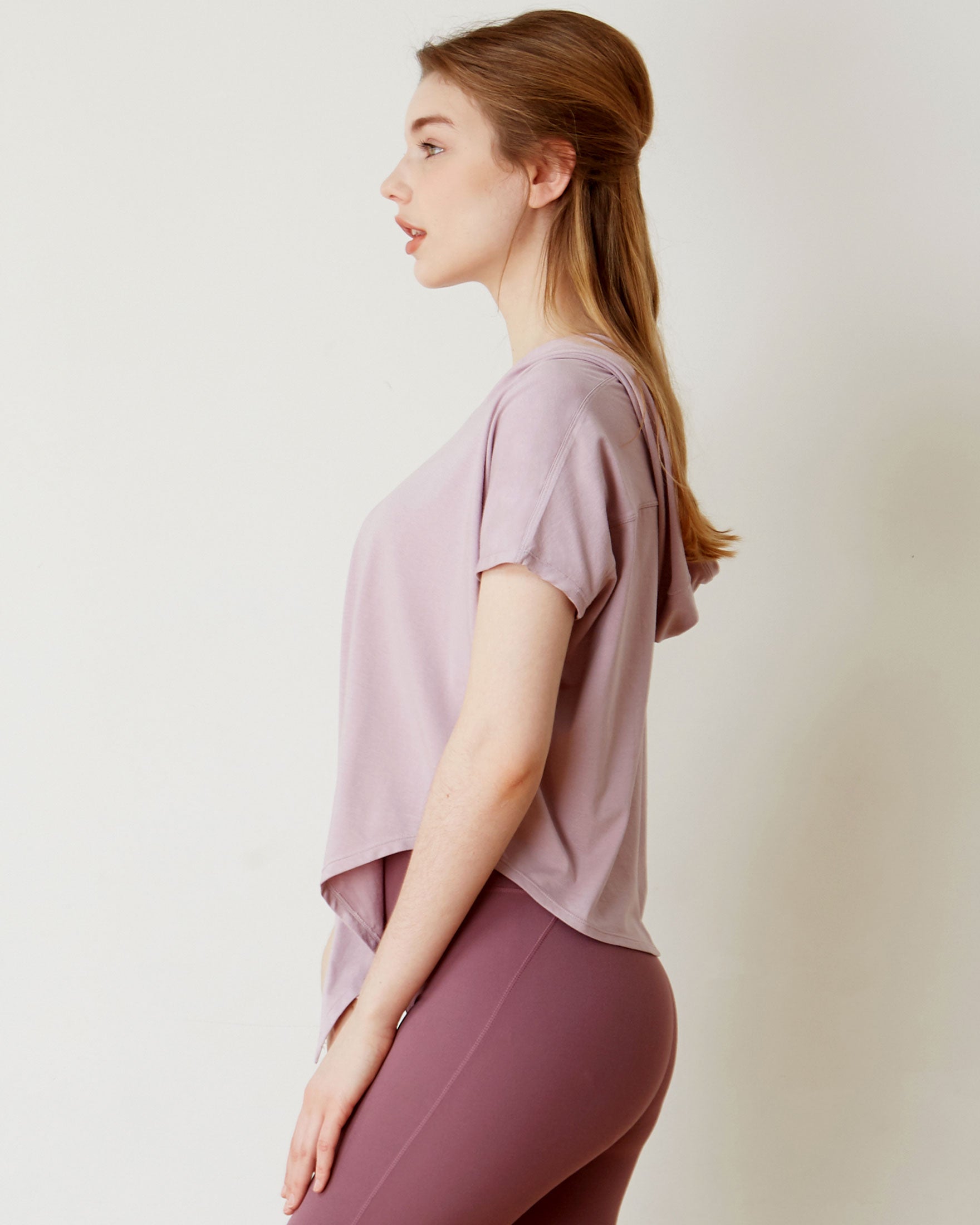 A stylish Knot Your Race Hoodie in a soft pima cotton/modal blend, showcasing its versatile design and comfortable fit.