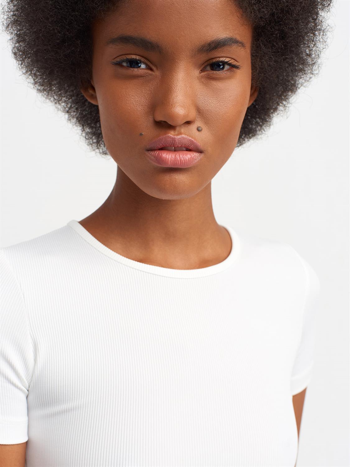 A stylish Lace Up Crop Top featuring a chic lace-up front design, made from a comfortable nylon-elastane blend.