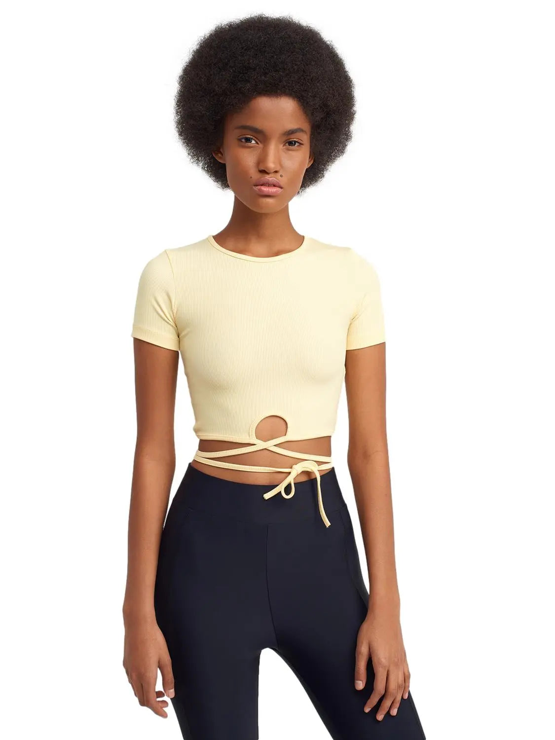 A stylish Lace Up Crop Top featuring a chic lace-up front design, made from a comfortable nylon-elastane blend.