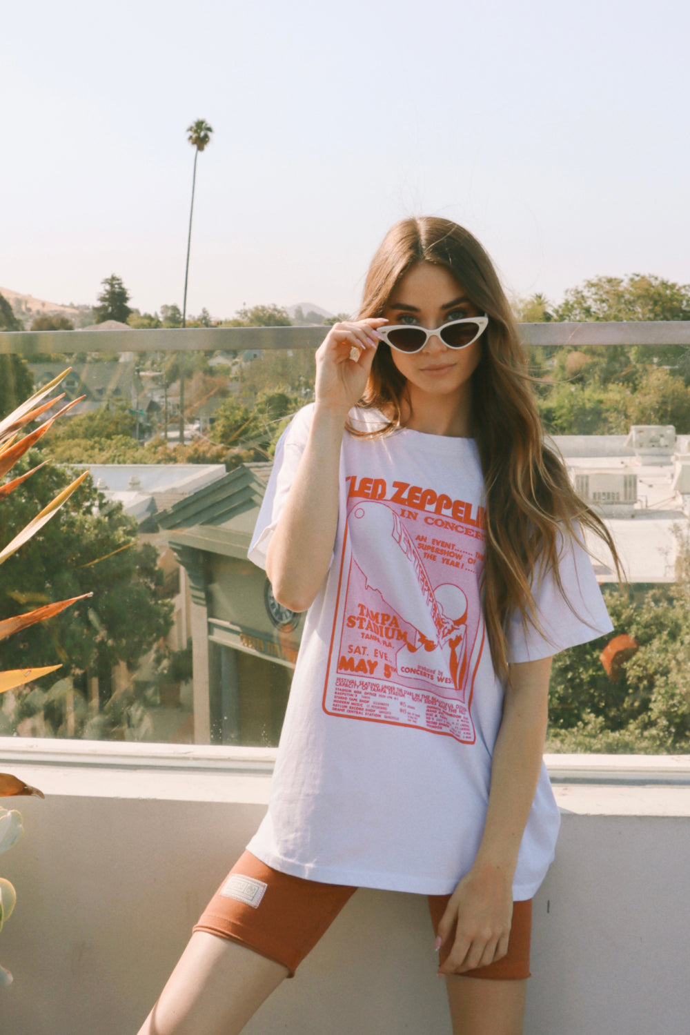 Led Zeppelin Tampa Stadium Tee in white, featuring a relaxed boyfriend fit made from 100% organic cotton, perfect for summer wear.