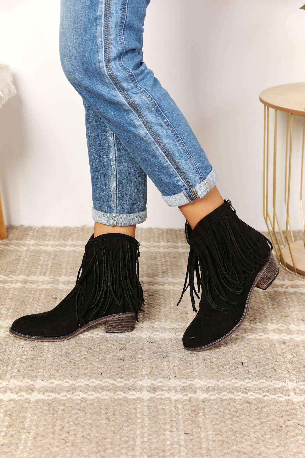 Legend Women's Fringe Cowboy Western Ankle Boots featuring stylish fringe detailing and a low block heel design.
