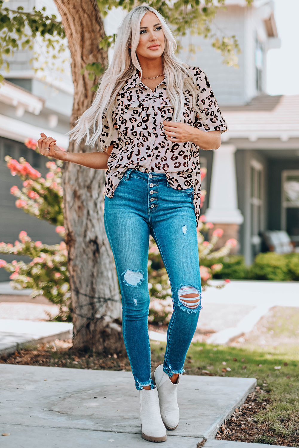 Leopard Button Front Short Sleeve Shirt with Breast Pockets, featuring a chic design and functional pockets, perfect for casual wear.
