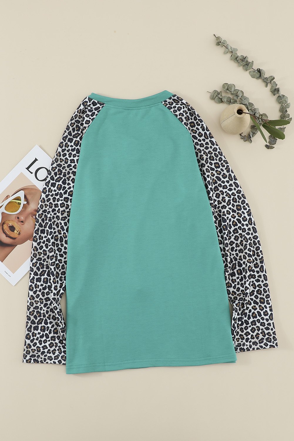 Leopard Patchwork Lace-up Front Long Sleeve Top featuring a stylish lace-up neckline and relaxed fit, perfect for casual wear.