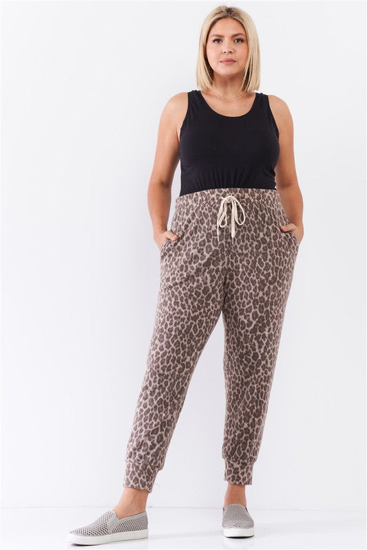 Leopard print soft lounge pants in taupe and brown, featuring a stretchy high waist and cuffed bottoms, perfect for cozy lounging.