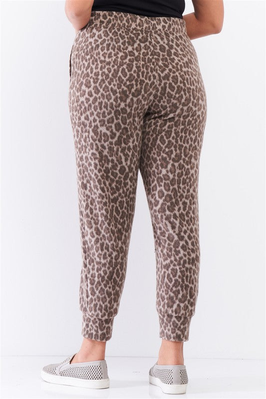 Leopard print soft lounge pants in taupe and brown, featuring a stretchy high waist and cuffed bottoms, perfect for cozy lounging.