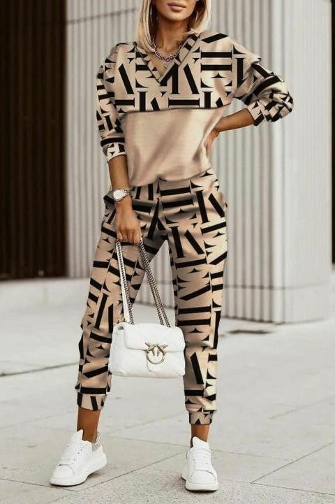 Black and beige faux velvet tracksuit featuring letter print sweatshirt and long pants, showcasing stylish design and comfortable fit.