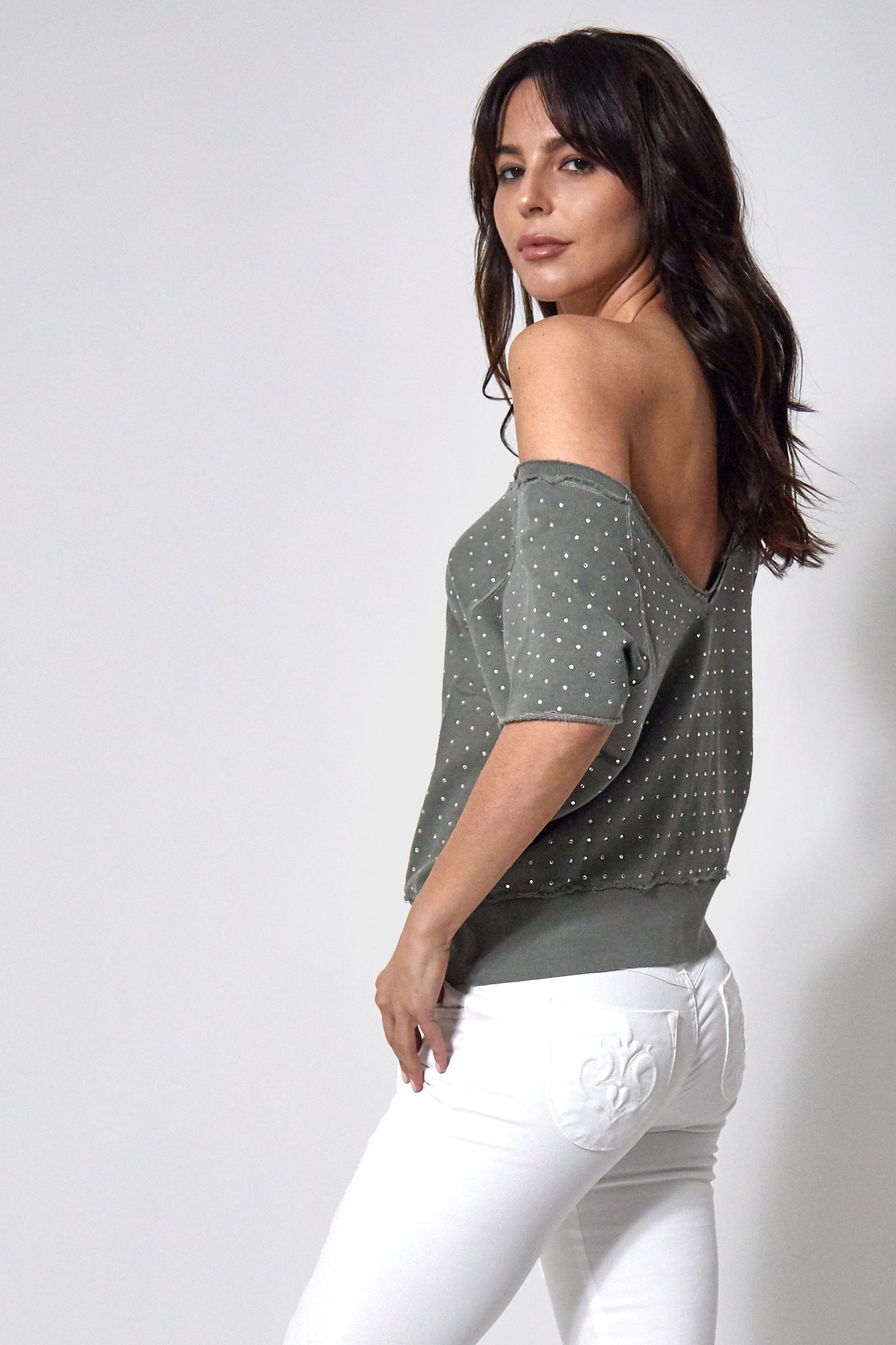 Lexi Pullover in Army Green featuring a relaxed fit and open back design, made from 100% cotton.
