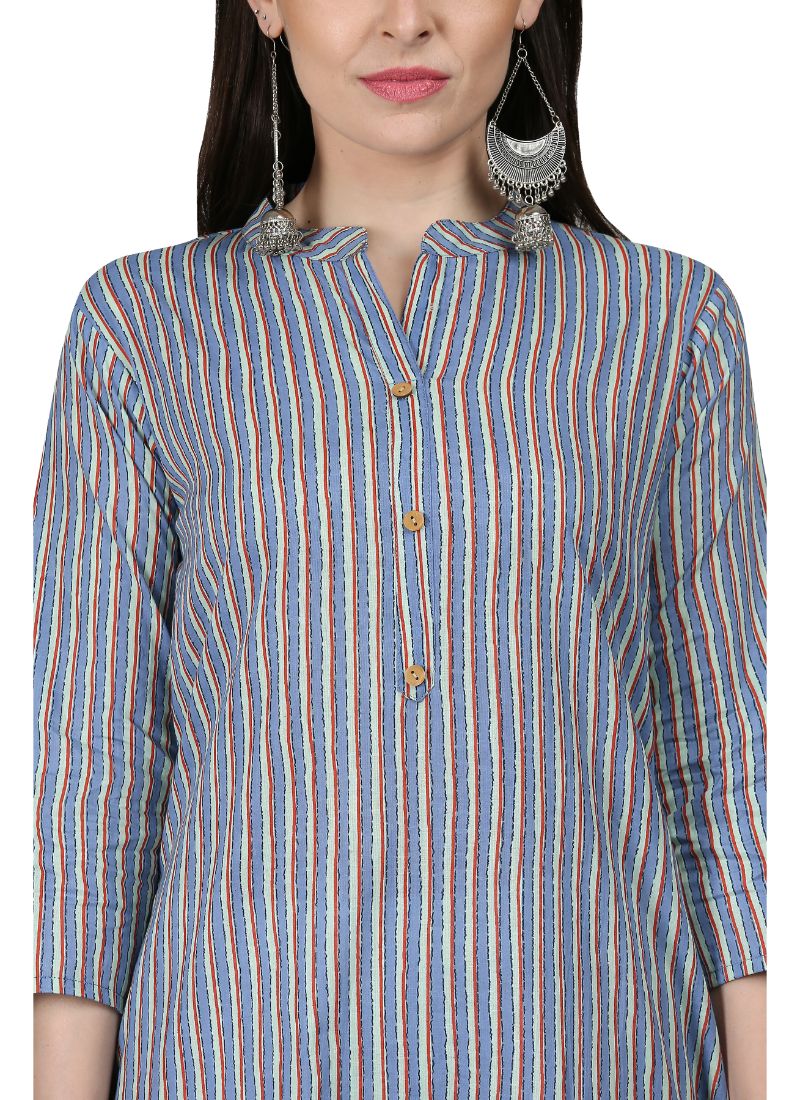Striped kurti with large earrings.