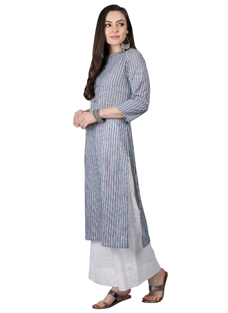 Woman in striped kurta outfit.