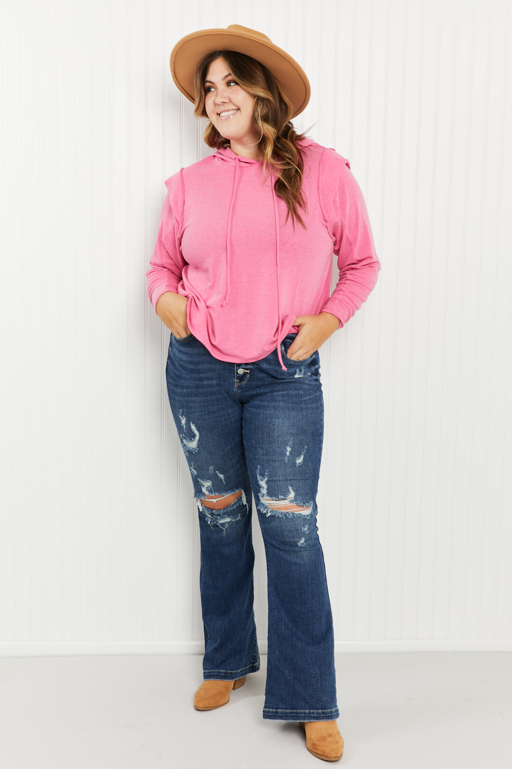 Live Simply Full Size Shoulder Detail Knit Hoodie in a studio setting, showcasing its stylish shoulder details and lightweight fabric.