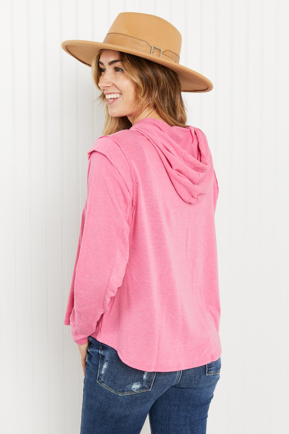 Live Simply Full Size Shoulder Detail Knit Hoodie in a studio setting, showcasing its stylish shoulder details and lightweight fabric.