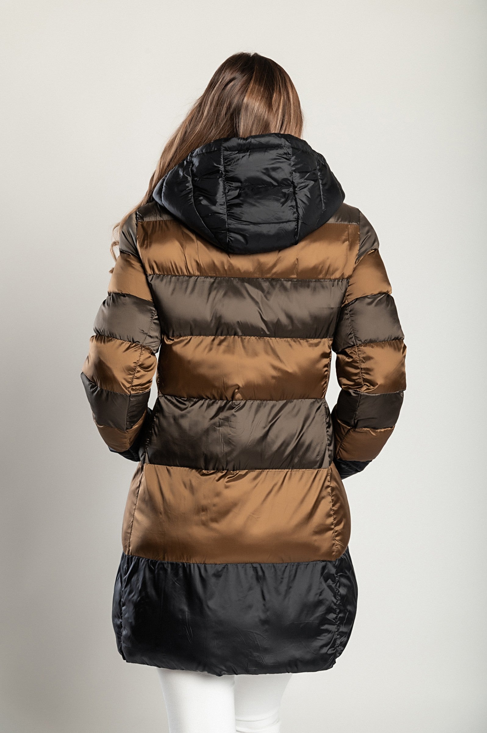 Long camel jacket with hood, high collar, and zip closure, showcasing its stylish design and warm filling.