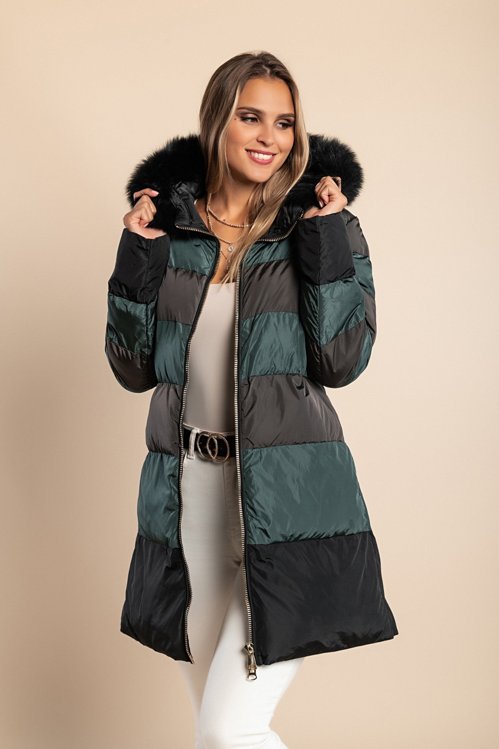 Long petrol jacket with hood and faux fur trim, featuring a high collar and zip closure, perfect for cold weather.